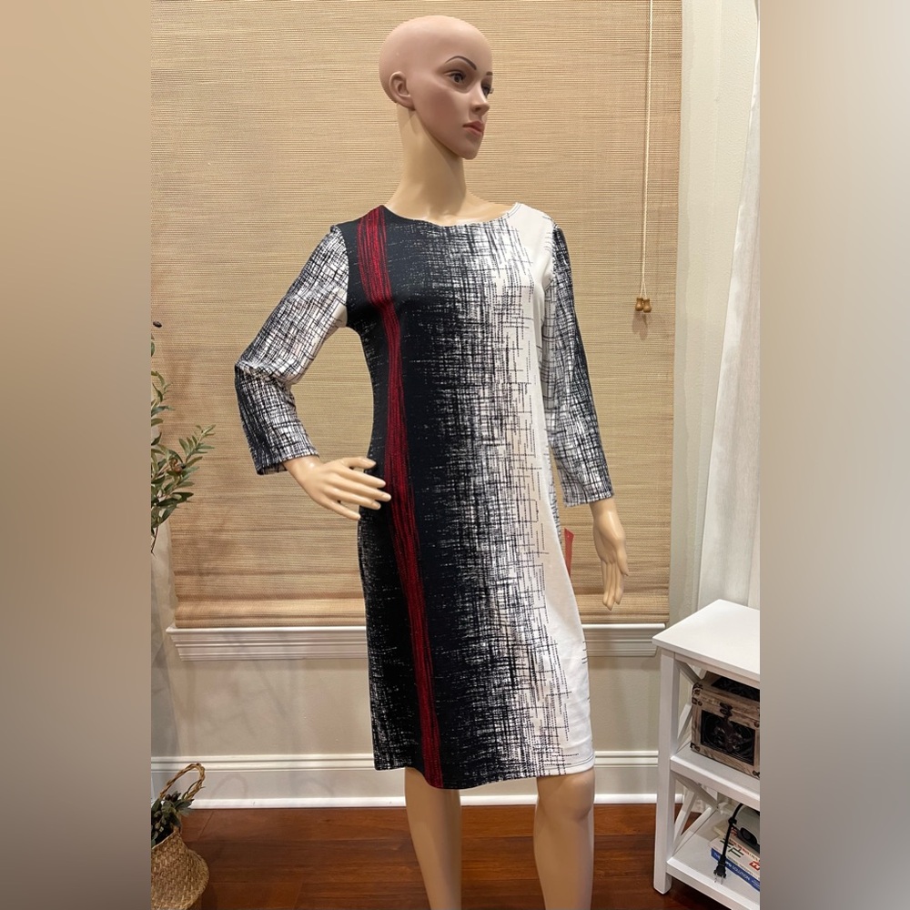 Sunny Leigh dress. Black, white, red. Back zipper. Size small.
New with tags